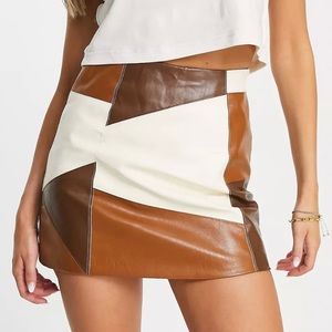 ASOS Design faux leather patchwork mini skirt